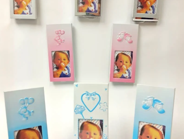 Casa Enrique: Pink and blue baby photo frames with balloon and heart designs.